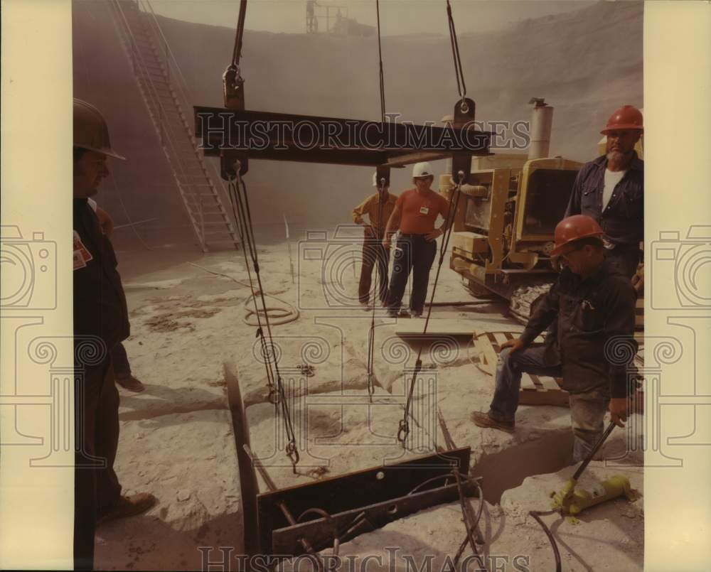 1975 Texas Utilities Co - Removing concrete blocks with crane - Historic Images