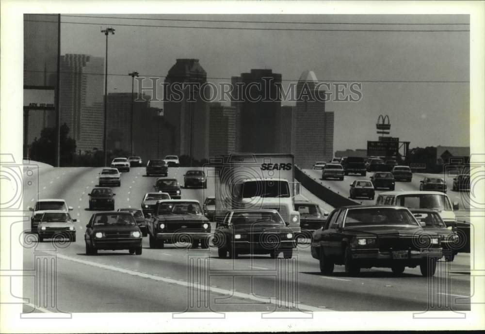 1990 Traffic in Houston - Skyline in background - Historic Images