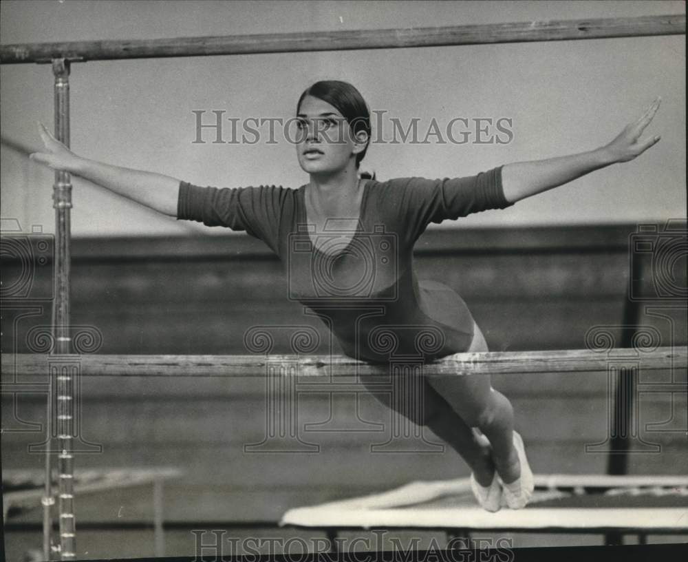 1968 Press Photo Rita Ellis Practices on YWCA's Parallel Bars, Houston, TX - Historic Images