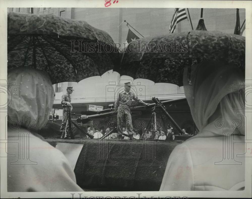 1965 Press Photo Military men on tank in rainy Veterans Day parade, Houston - Historic Images