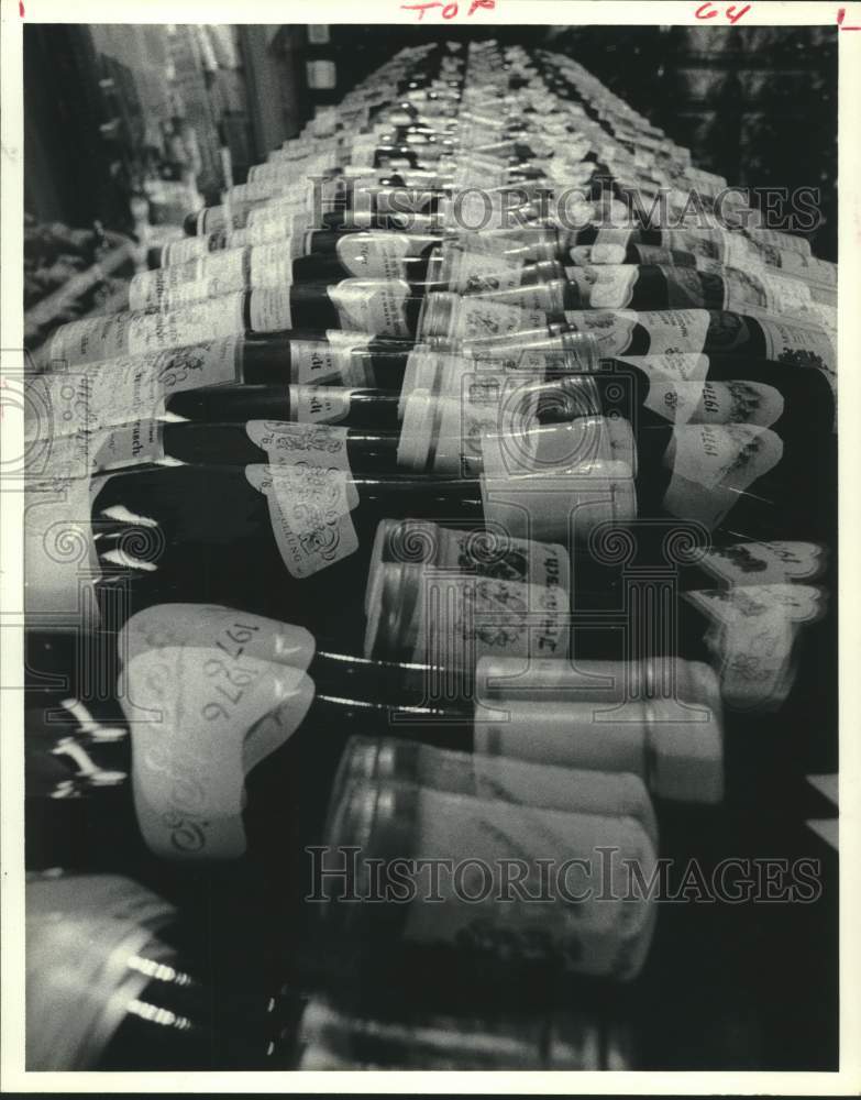 1979 Double-Exposure of Wine Bottles Likened to Some Folks Confusion - Historic Images