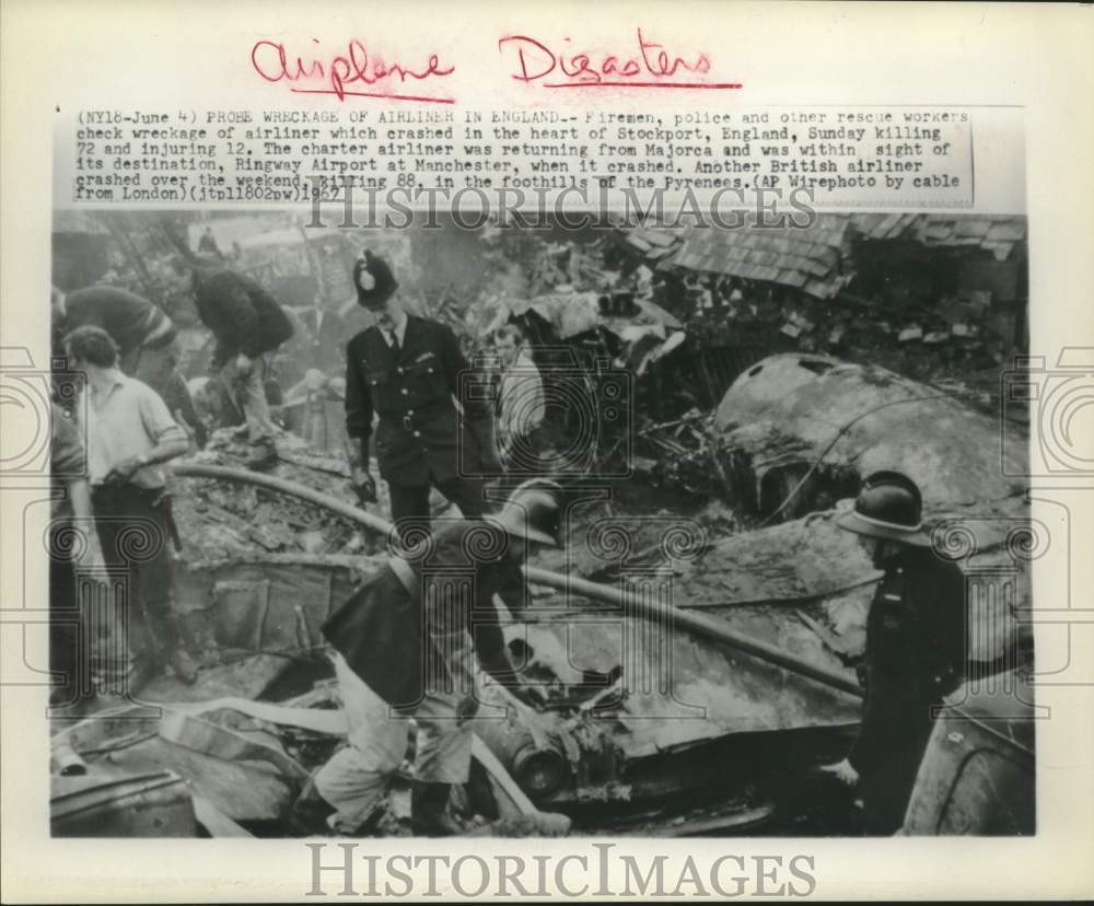 1967 Rescue workers check airliner wreckage in Stockport, England - Historic Images