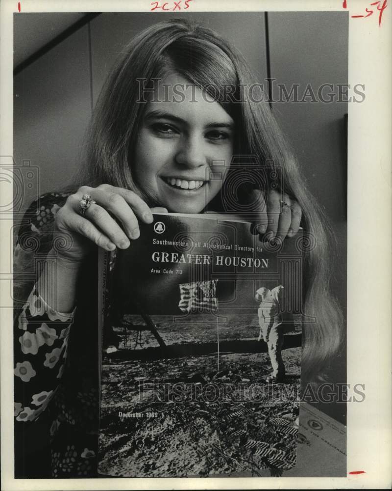 1969 Miss Janice Rocky with the New Southwest Telephone Directory - Historic Images