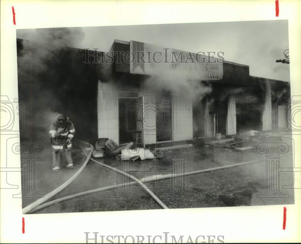 1987 Fireman Outside Burning Westside Upholstery &amp; Trim, Houston TX - Historic Images