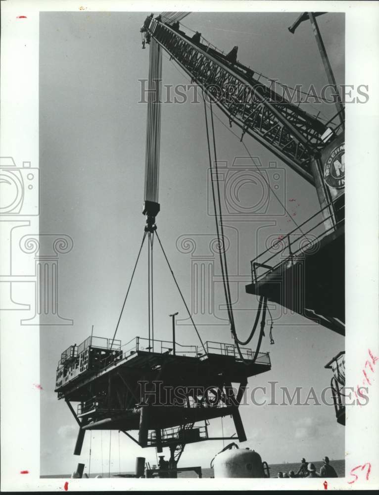 1982 Tenneco oil platform being dismantled for artificial reef in FL - Historic Images