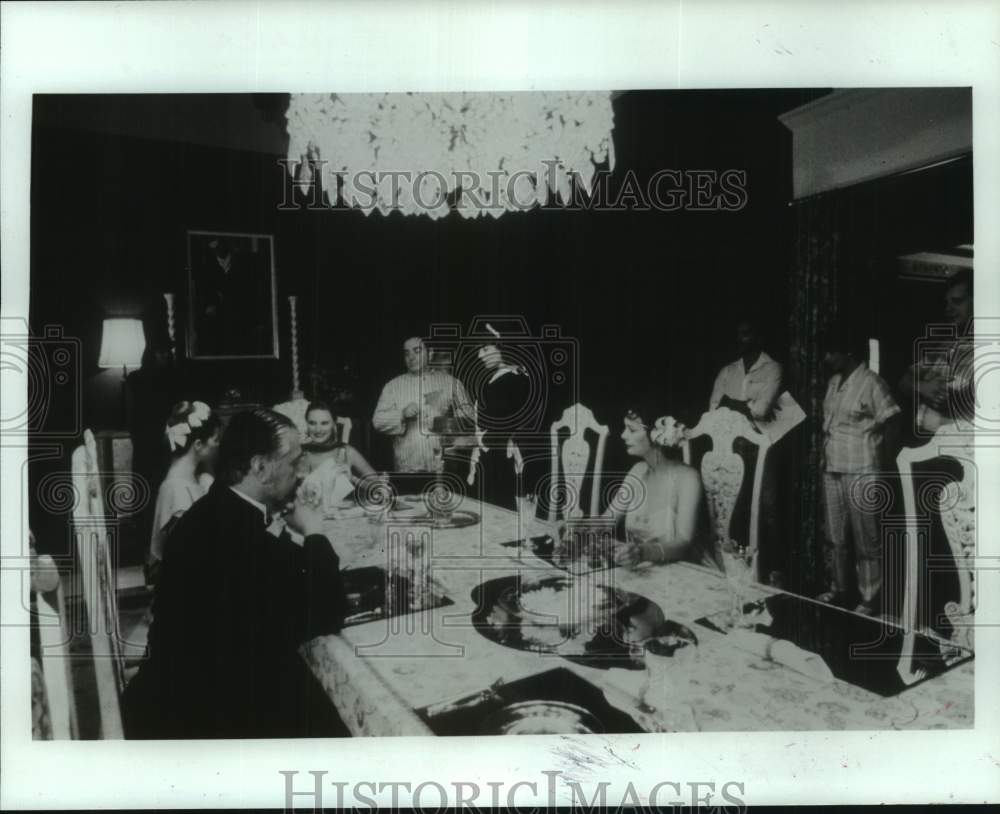 1987 Press Photo Group at table in scene from Los Angeles production of "Tamara" - Historic Images