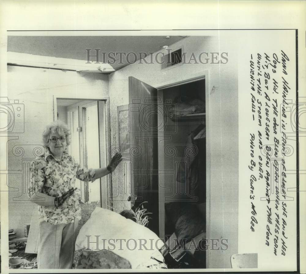 1979 Anna Hainline next to closet in which she hid during TX tornado - Historic Images