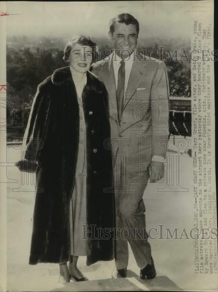 1949 Carry Grant and Betsy Drake en-route to airport and wedding; CA - Historic Images