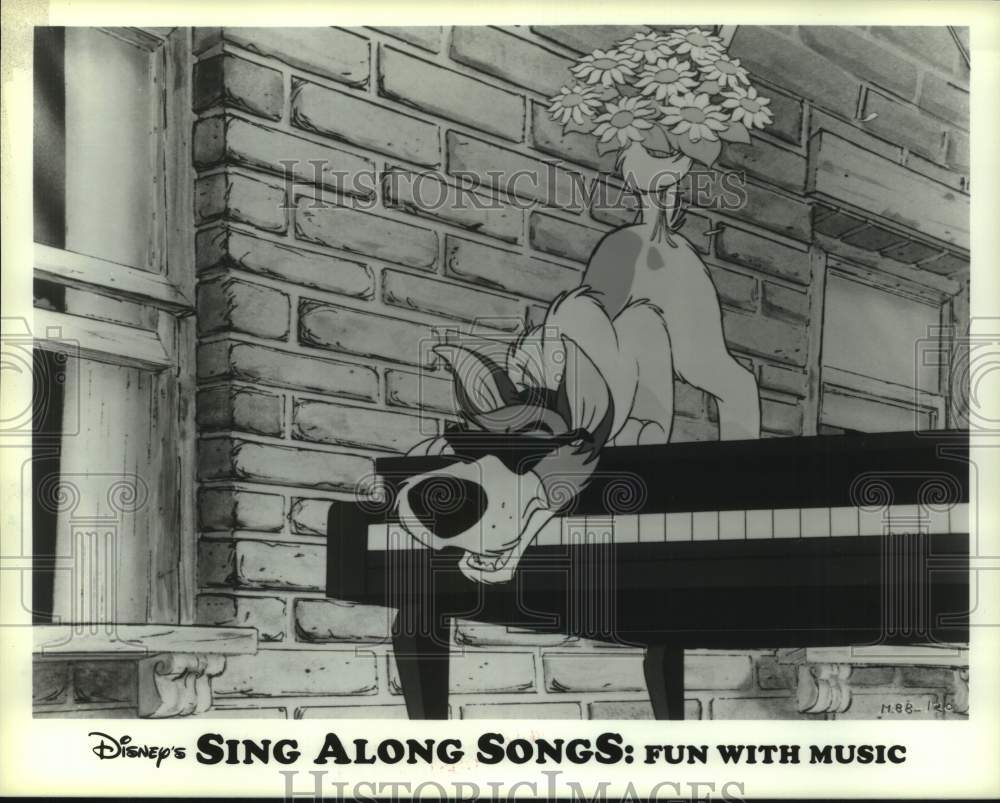 1989 Dog on piano - Disney's "Sing Along Songs: Fun with Music" - Historic Images