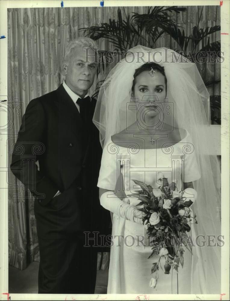 1985 Press Photo Tony Curtis and Susan Lucci at wedding in  "Mafia Princess" - Historic Images