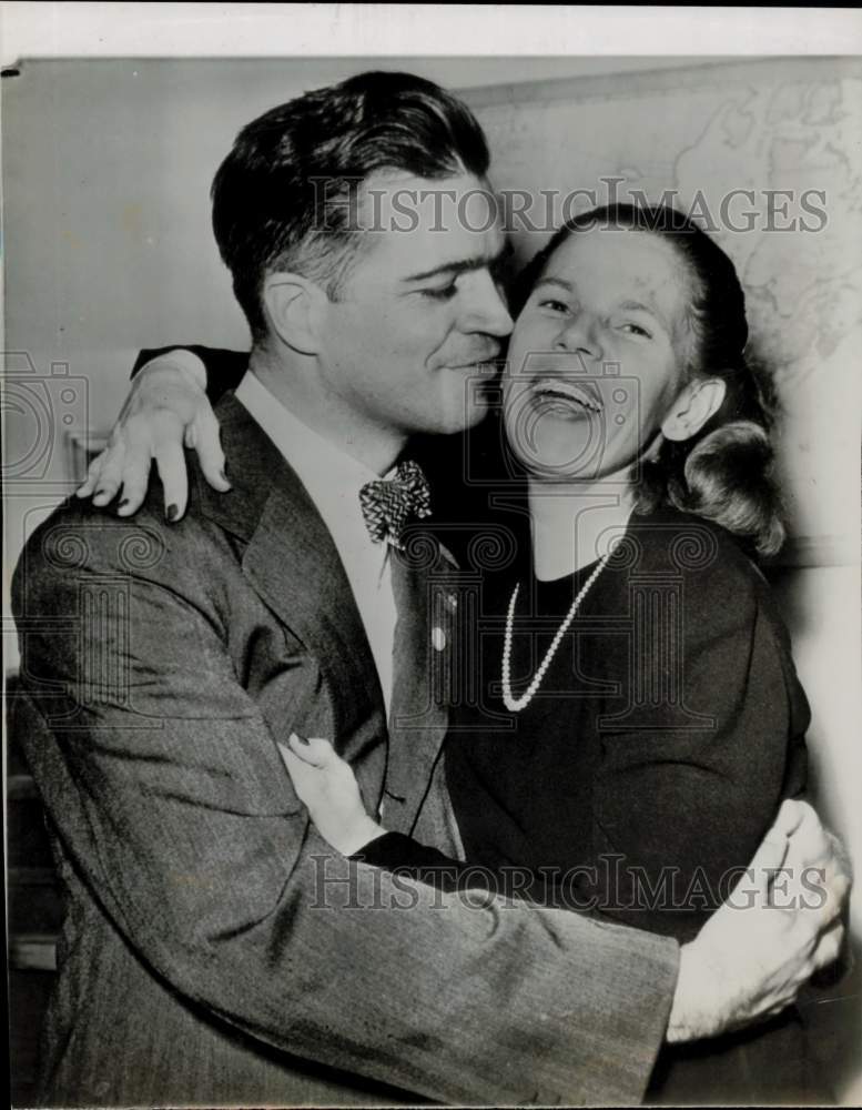 1959 Press Photo Michigan Governor Mennen Williams embraces woman - hpa56368- Historic Images