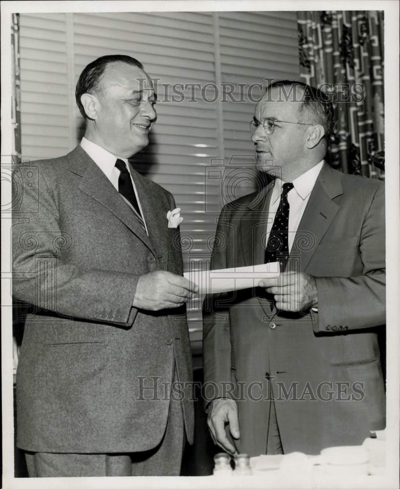 1957 Press Photo Dr. W.W. Kemmerer receives TV grant from President Abrams.- Historic Images