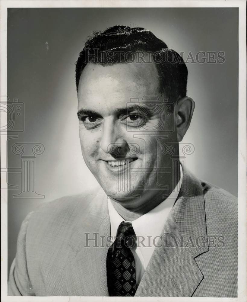 1955 Press Photo Loyd Cooke is new reservations manager for American Airlines.- Historic Images