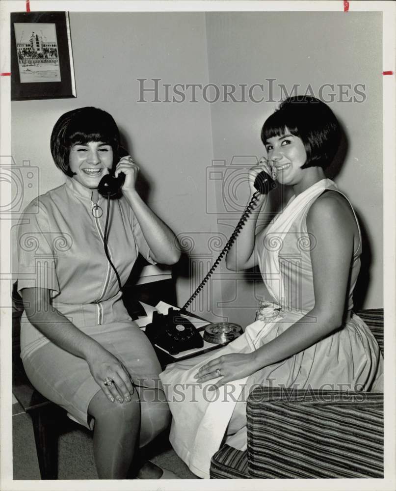 1965 Press Photo Amparo and Flor Procuna talk on phones in Houston. - hpa77135- Historic Images