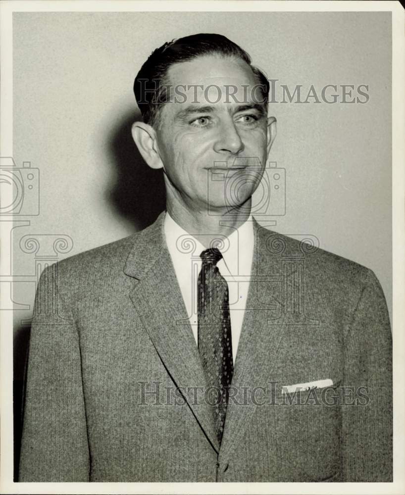 1957 Press Photo Odell Sanders, Champion Paper and Fibre of Pasadena officer.- Historic Images