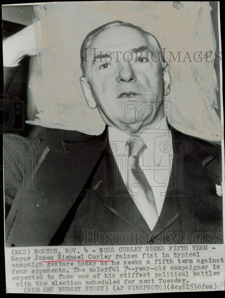 1956 Press Photo Mayor James Michael Curley raises fist in campaign gesture.- Historic Images