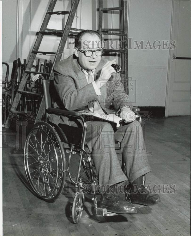 1958 Press Photo George Schaefer, producer-director, uses wheelchair on stage.- Historic Images