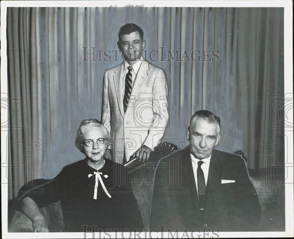 1958 Press Photo Oscar Ellis, TDC Director poses with wife and son. - hpa85730- Historic Images