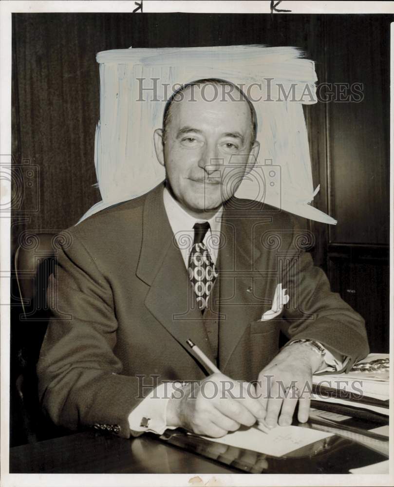 1956 Press Photo Abe I. Lack, Houston businessman works at his desk. - hpa91205- Historic Images