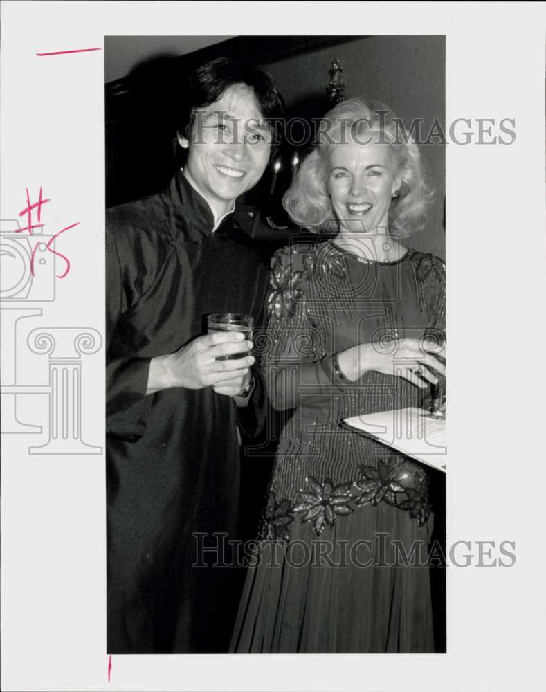 1991 Press Photo Li Cunxin poses with Nancy Hawes at party. - hpa93257- Historic Images