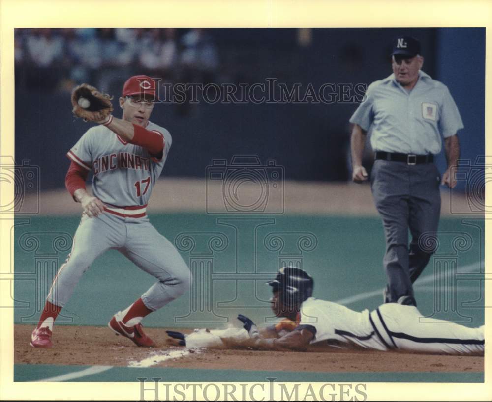 1988 Press Photo Gerald Young crawls at base as Chris Sabo takes throw - Historic Images