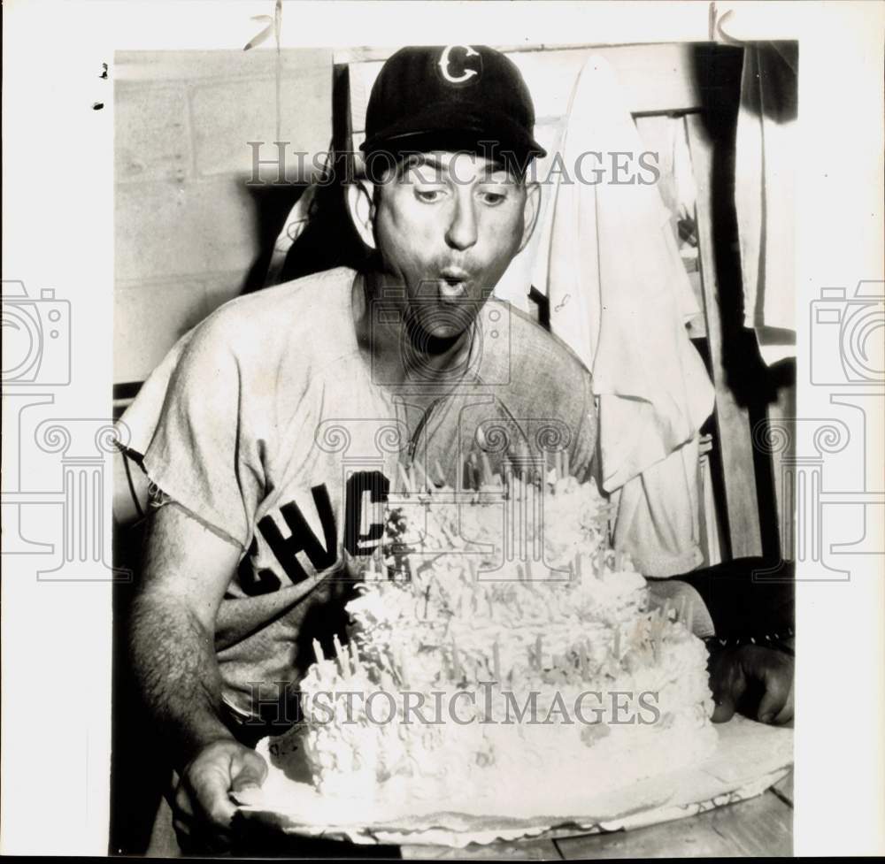 1958 Press Photo Luke Appling attempts to blow out cake candles. - hps09122 - Historic Images