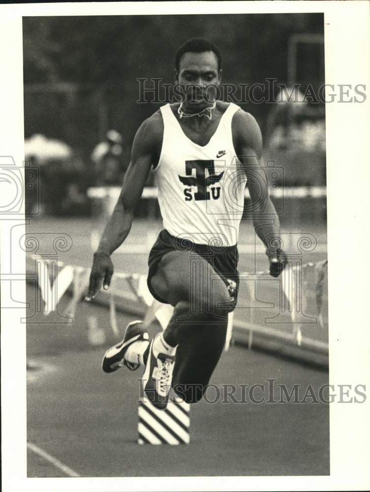 1987 Press Photo Texas Southern Track Athlete Paul Emordi Completes Triple Jump - Historic Images