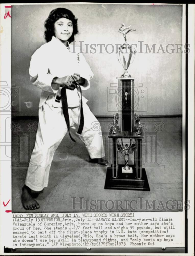 1973 Press Photo Zinnia Valenzuela stands by trophy at karate meet in Arizona - Historic Images