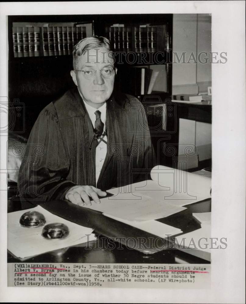 1958 Press Photo Federal District Judge poses in his Alexandria chambers. - Historic Images