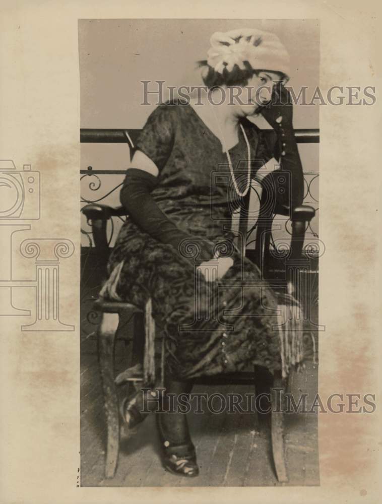 1923 Press Photo Woman looks sad sitting in chair - kfa04426 - Historic Images