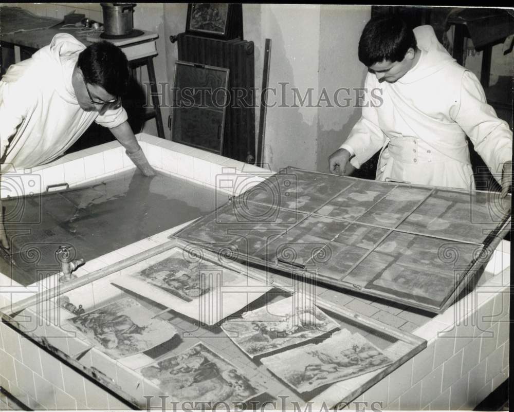 1966 Press Photo Ancient books being restored using chemical bath - kfa33066- Historic Images