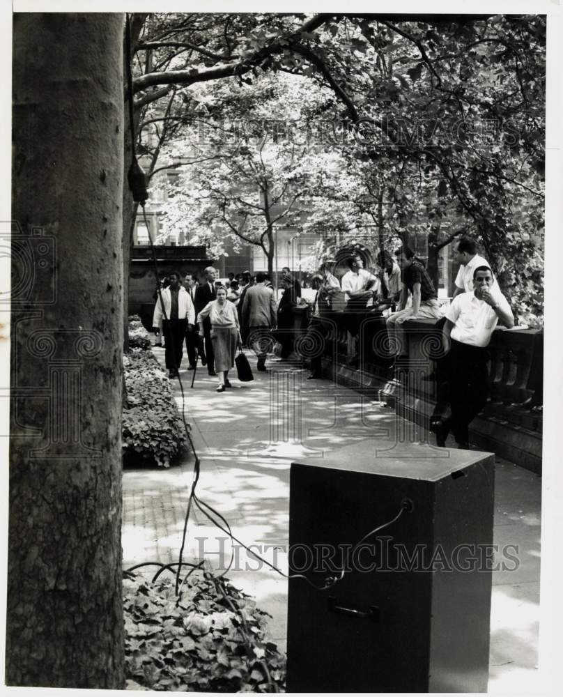 1964 Press Photo People begin to move along after concert in the park is over.- Historic Images