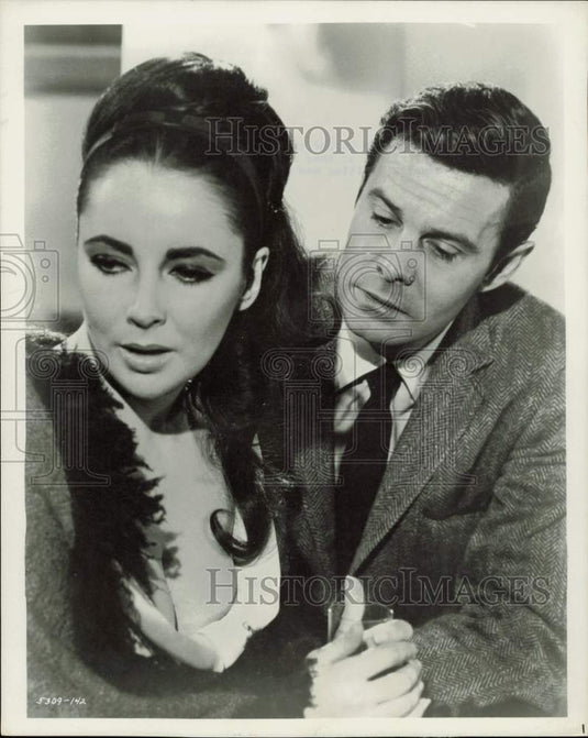 Press Photo Elizabeth Taylor and Louis Jourdan star in film "The V.I.P.s"- Historic Images