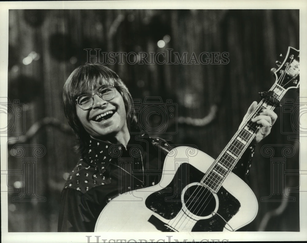 Musician John Denver on The John Denver Show on ABC  - Historic Images