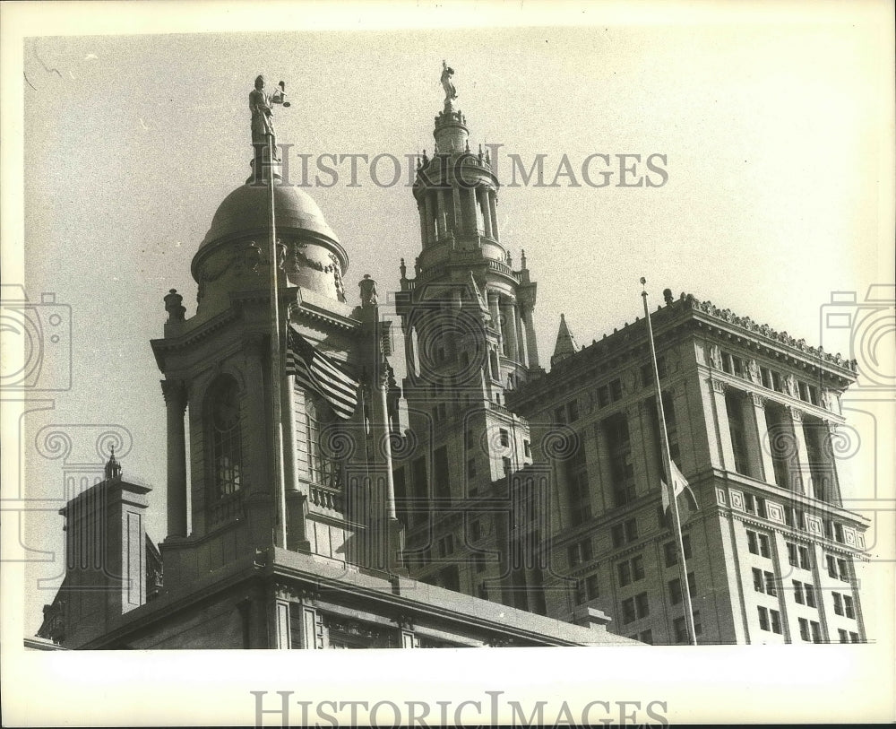 1979 Flags at half mast at NYC City Hall for Rockefeller death - Historic Images