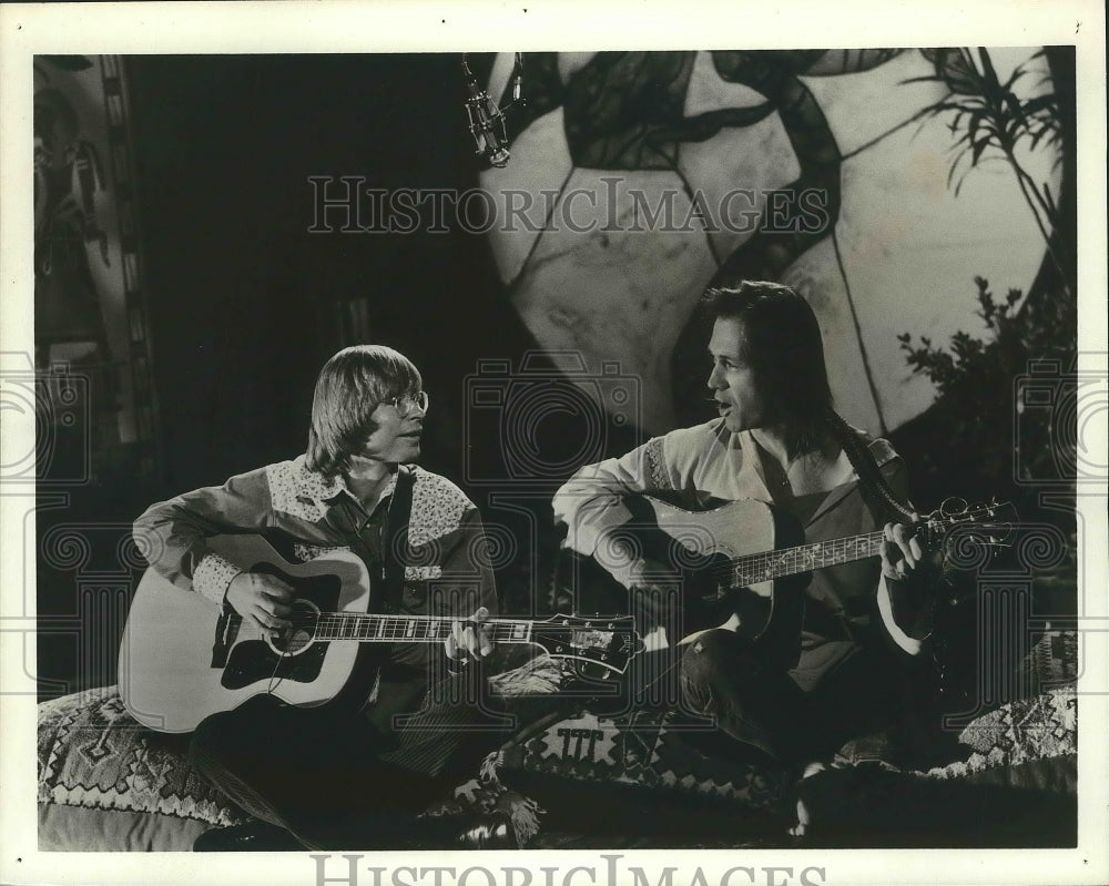 Folk Singer John Denver with Actor David Carradine  - Historic Images