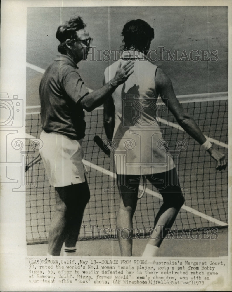 1973 Margaret Court Gets Pat From Bobby Riggs After He Defeated Her - Historic Images