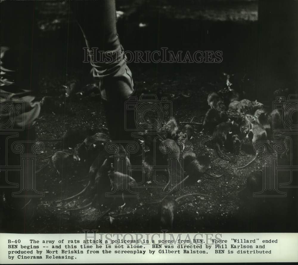 Press Photo Policeman being attacked by rats in a scene of "Ben" - Historic Images