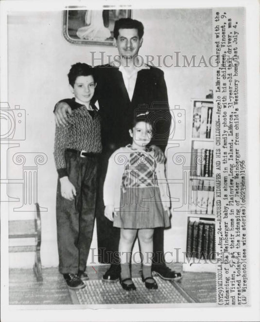 1956 Press Photo Angelo LaMarca poses with his children at their Plainview home- Historic Images