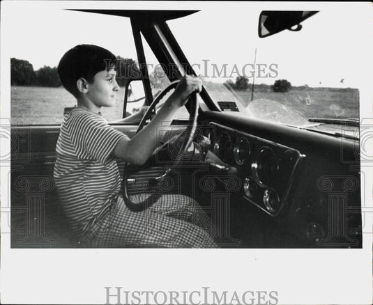 1972 Press Photo Young boy at driver's seat of truck - lra74396- Historic Images