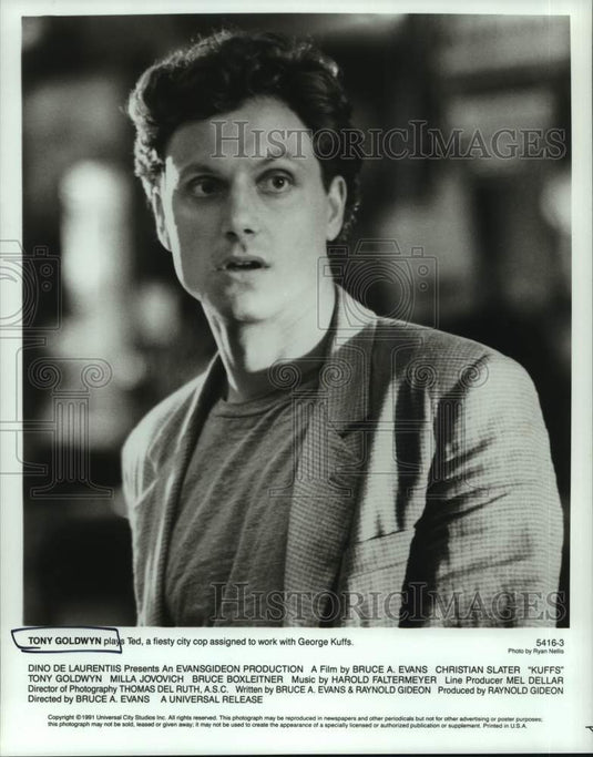 1991 Tony Goldwyn plays Ted a fiesty city cop in "Kuffs" - Historic Images