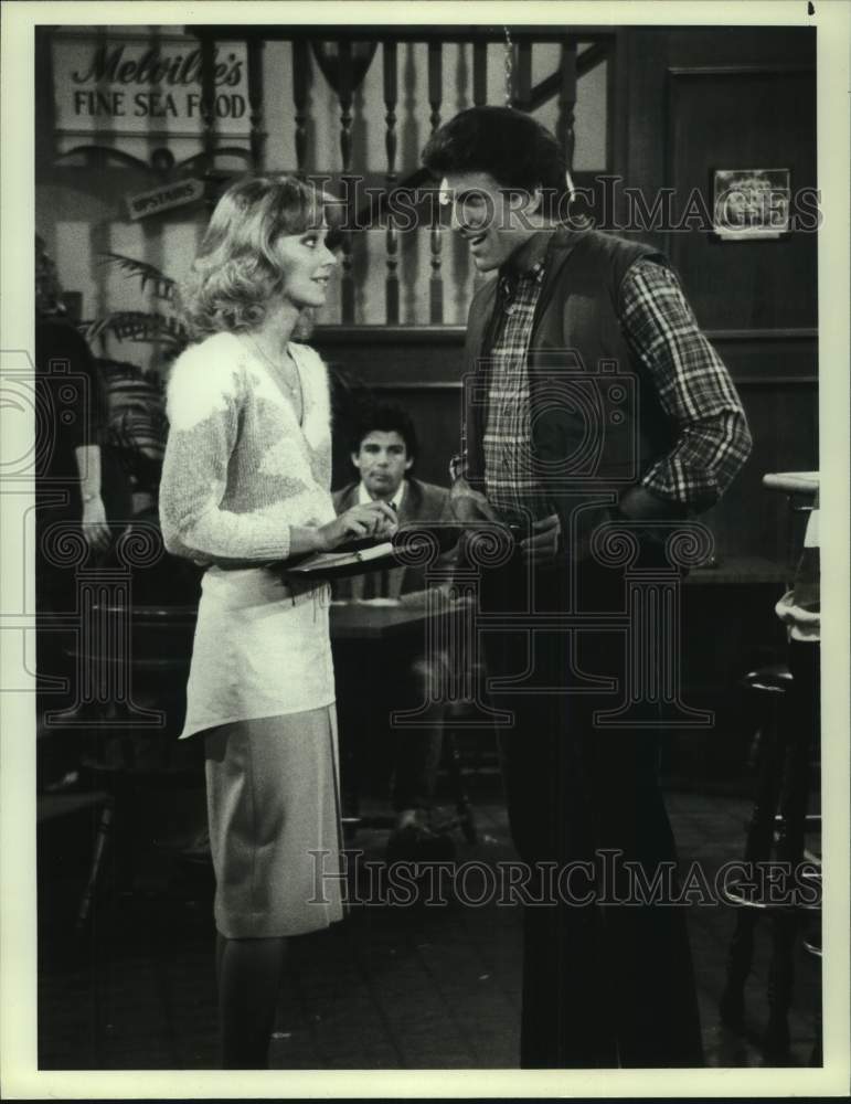 1984 Shelley Long and Ted Danson in a scene from the series &quot;Cheers&quot; - Historic Images