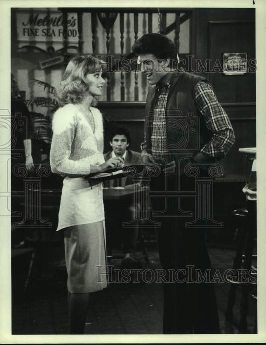 1984 Shelley Long and Ted Danson in a scene from the series "Cheers" - Historic Images