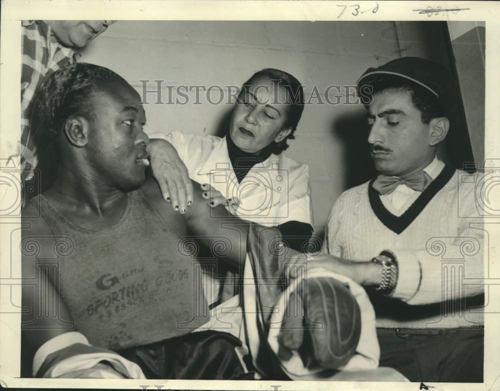 1955 Kid Gavilan Gets Arm Rub From Irmina As Manager Yamil Watches - Historic Images