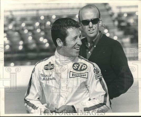 1969 Race car driver Mario Andretti with fan in background.-Historic Images