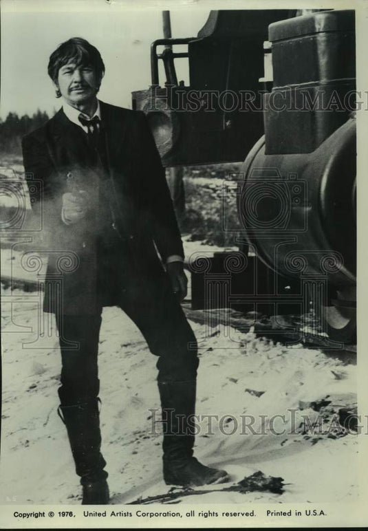 1976 Charles Bronson as a frontier cardsharp in "Breakheart Pass" - Historic Images