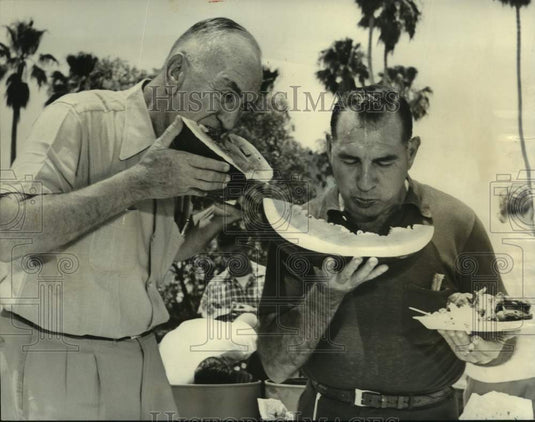 1956 Press Photo Eddie Rickenbacker & Tony Pitisci Deep in Watermelon at Picnic- Historic Images