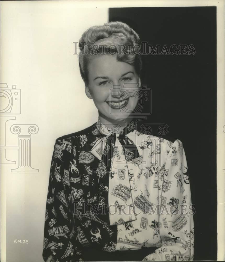 1943 Kyle MacDonnell wears a &quot;Madame Butterfly&quot; inspired blouse - Historic Images