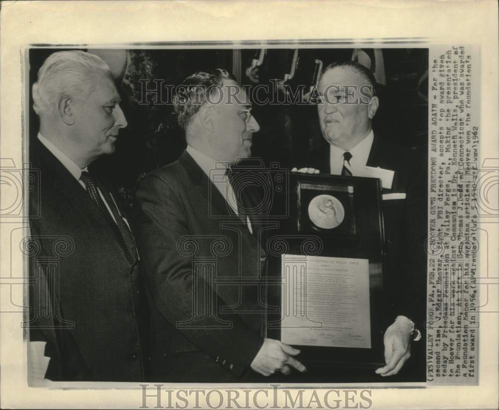 1962  Director J. Edgar Hoover gets award from Freedoms Foundation - Historic Images