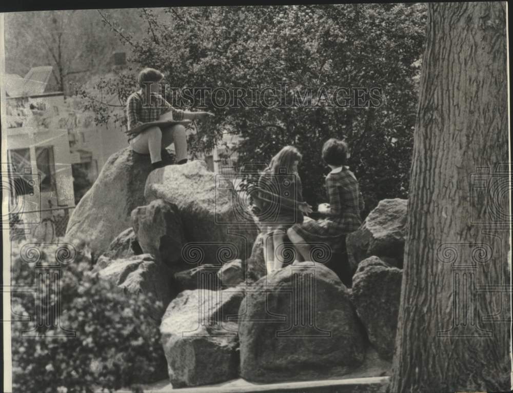 1967 Golden Junior High School Student enjoying early Spring Sun - Historic Images